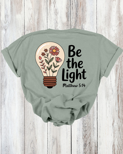 Saved Out Loud Christian Branded Unisex Statement T-shirt- Be The Light, Matthew, Flower Lightbulb